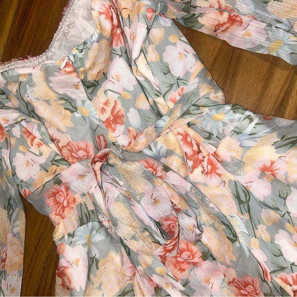 NWOT Floral Long Sleeve Romper with tie in the back and smocked sleeves - Picture 8 of 8